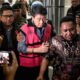 Gedung Kejaksaan Agung RI di Jakarta dengan latar belakang bendera merah putih
