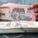 Grafik pergerakan nilai tukar mata uang rupiah terhadap dolar Amerika Serikat di layar monitor