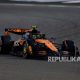 Lando Norris merayakan keberhasilannya meraih pole position pada sesi kualifikasi F1 GP Belanda di Sirkuit Zandvoort.
