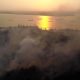 Kabut asap menyelimuti wilayah Kalimantan akibat kebakaran hutan dan lahan serta emisi PLTU batu bara.