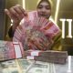 Grafik pergerakan nilai tukar mata uang Rupiah terhadap Dolar Amerika Serikat di layar monitor