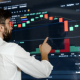 Suasana layar monitor yang menampilkan grafik pergerakan indeks harga saham di Bursa Efek Indonesia