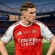 Penyerang Arsenal Viktor Gyokeres sedang berlari di lapangan hijau dalam sebuah pertandingan.