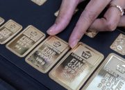 Tampilan antarmuka aplikasi Tring Pegadaian untuk investasi emas digital
