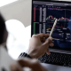 Grafik pergerakan Indeks Harga Saham Gabungan di layar monitor bursa efek