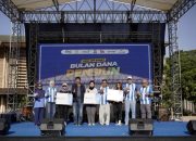 Suasana kegiatan Bulan Dana Pensiun bank bjb di Lapangan Saparua Bandung untuk meningkatkan literasi perencanaan keuangan.